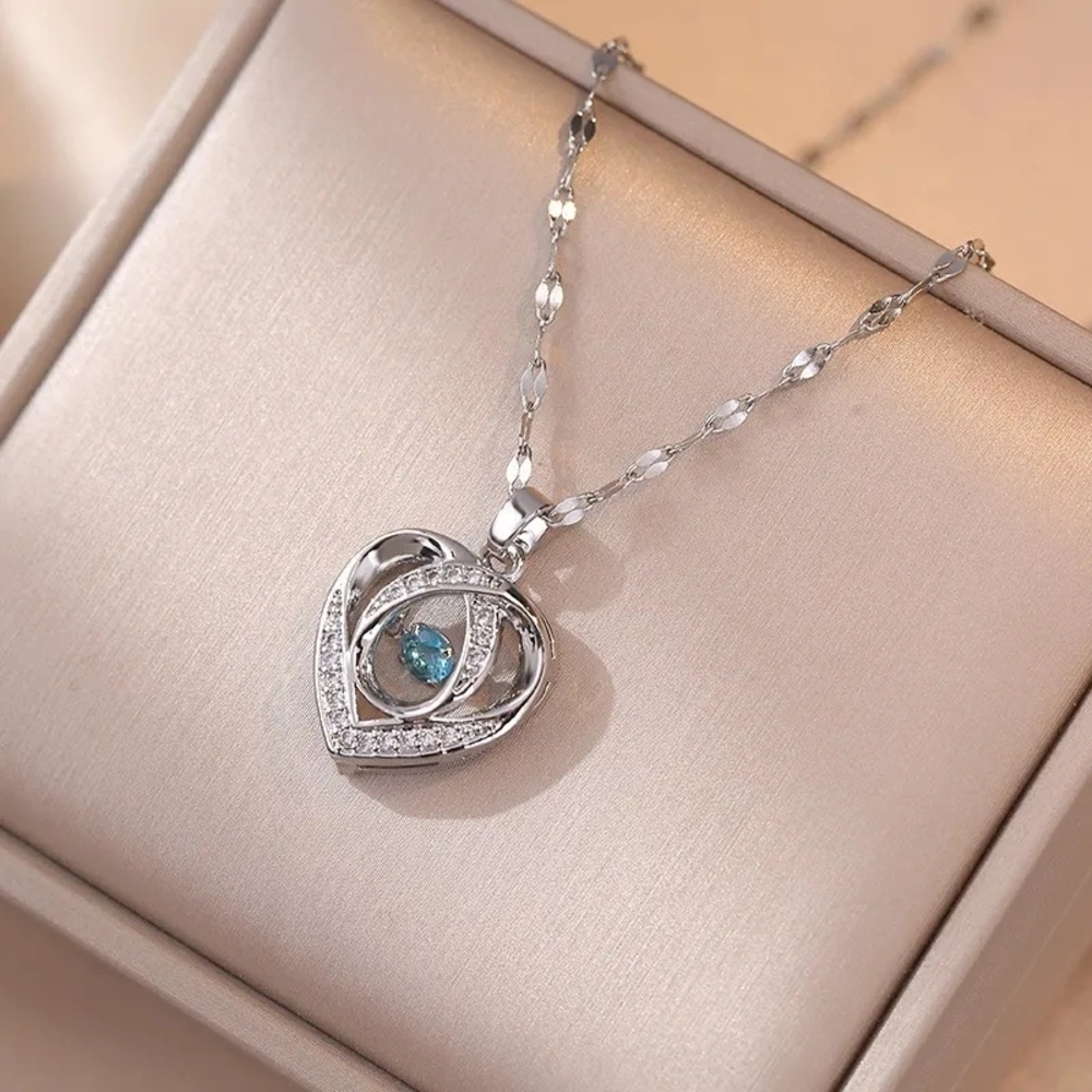 Silver necklace with heart design
